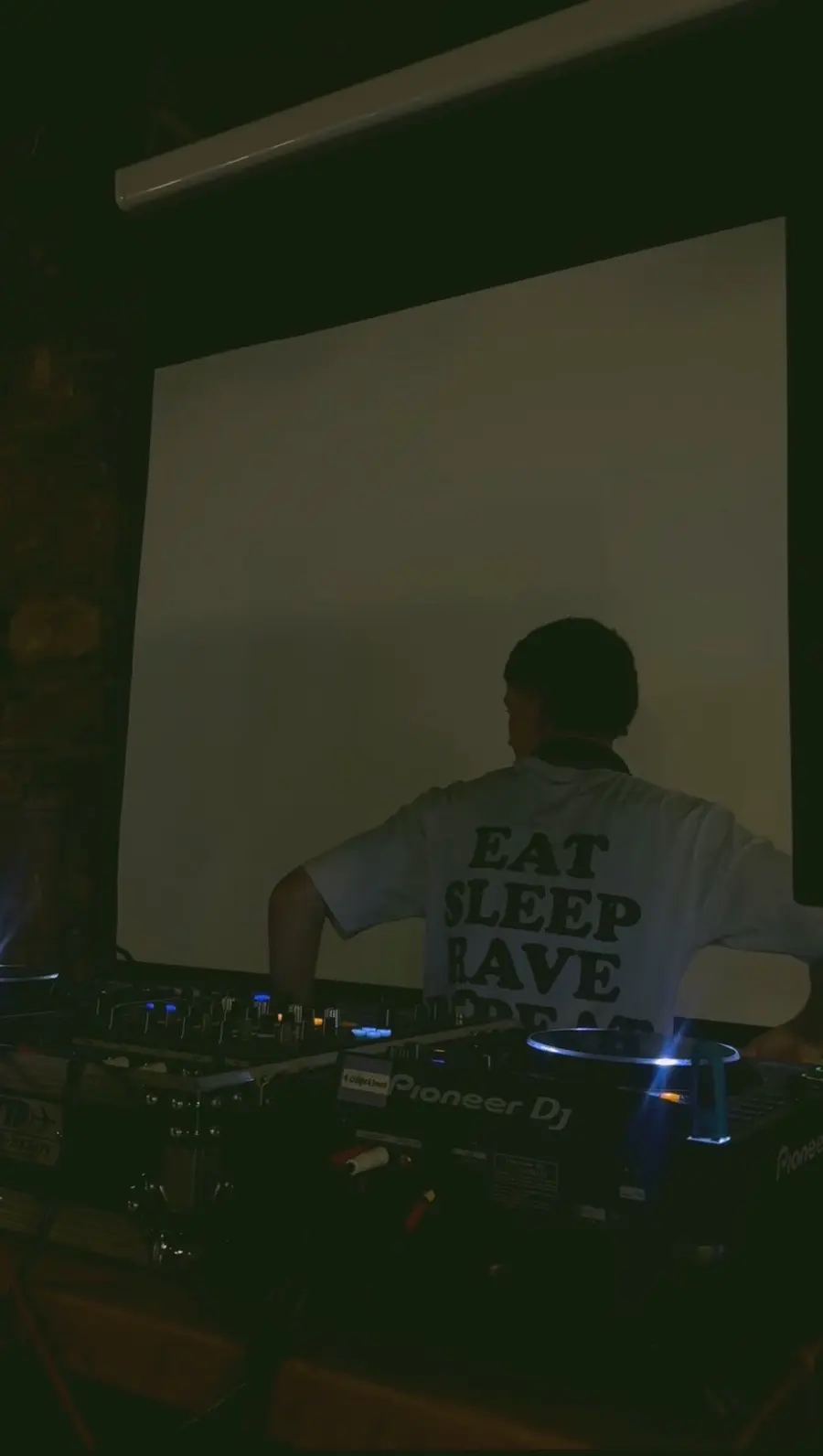 Eat sleep rave repeat, facing the screen