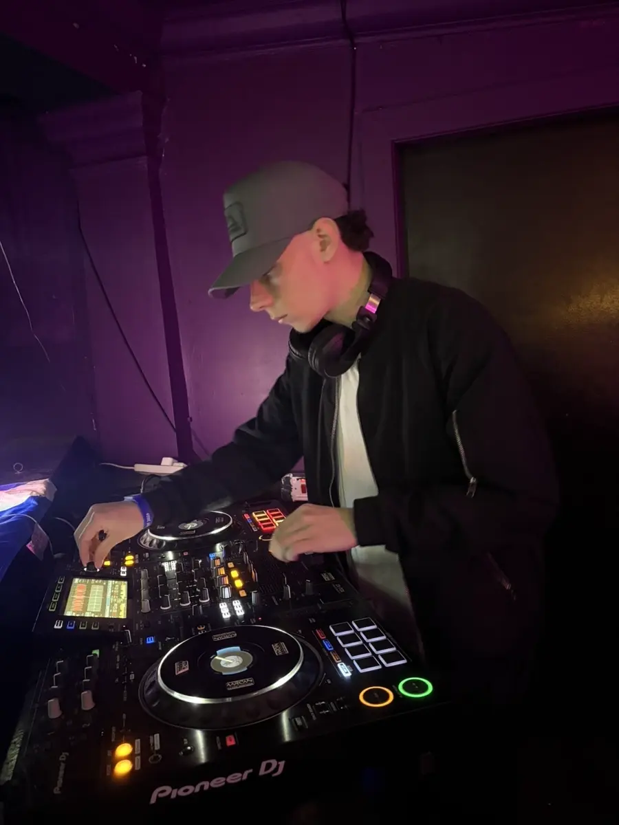 Hands on the mixer mid-set